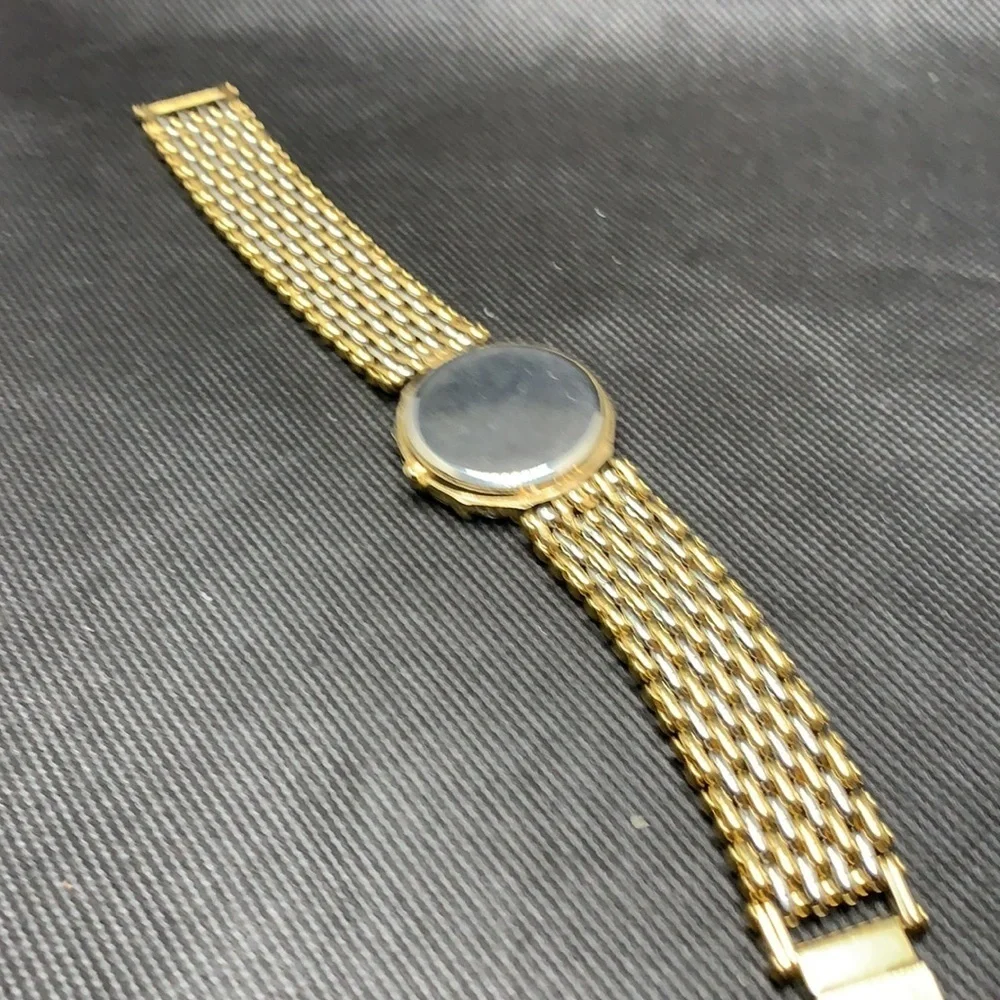 3/$27  Fashion watch with subtle two tone band